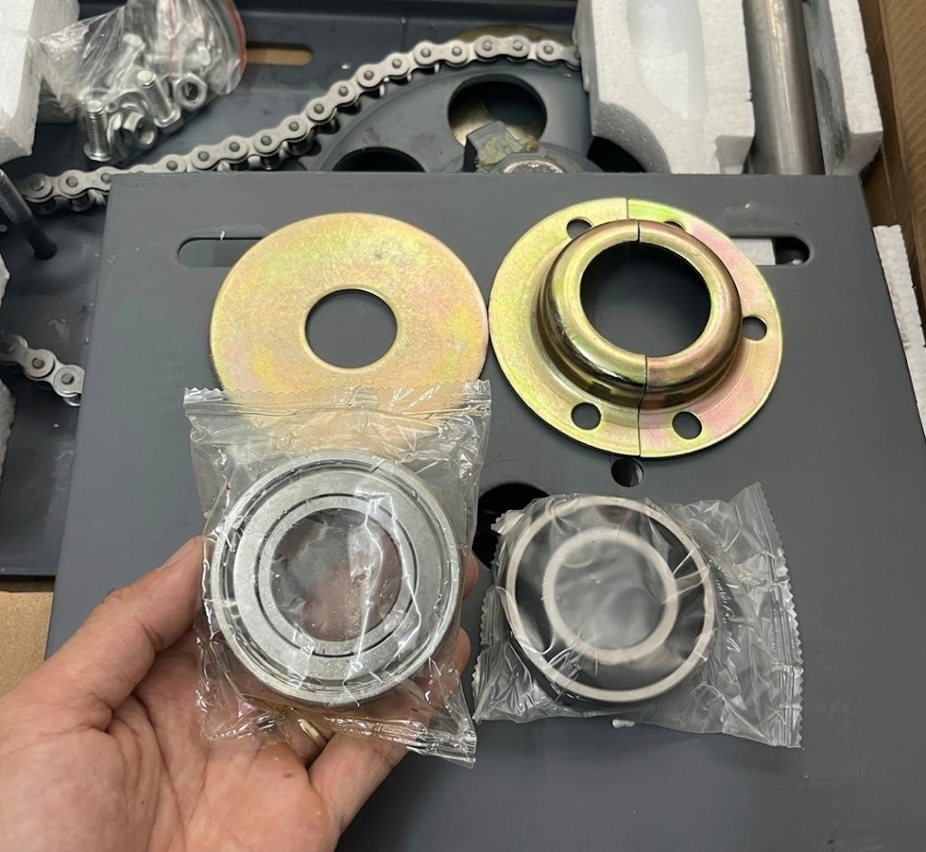 giá thay vòng bi cửa cuốn